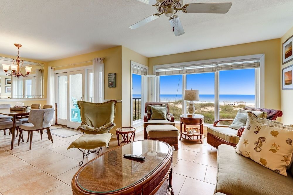 Seashore Condo with Balcony Overlooking the beach and the Atlantic by RedAwning