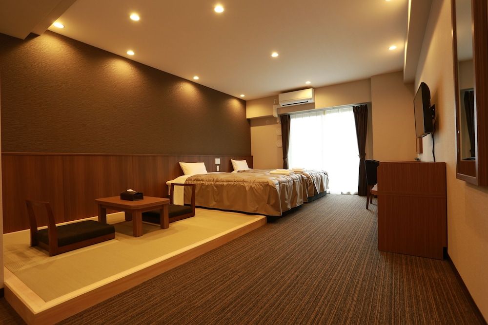 The Base Sakaihigashi Apartment Hotel