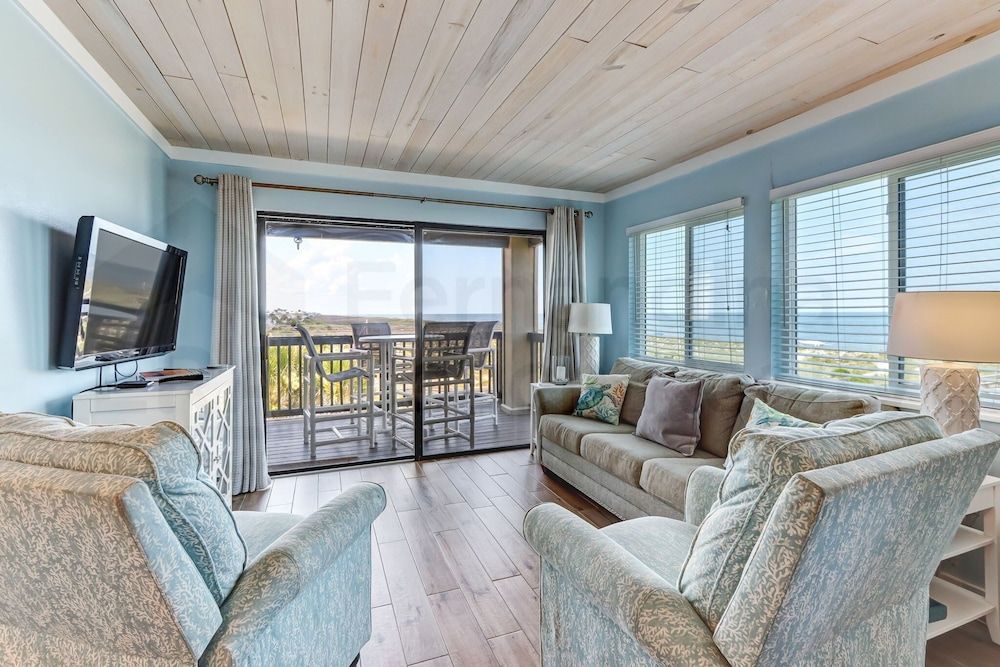 Newly Remodeled Oceanfront Condo with Salt Water Pool and Private Walkway to Beach by RedAwning